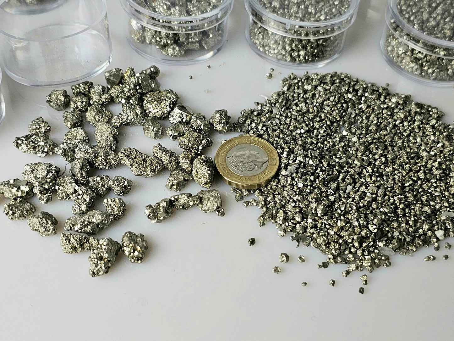 Pyrite crystals in display case