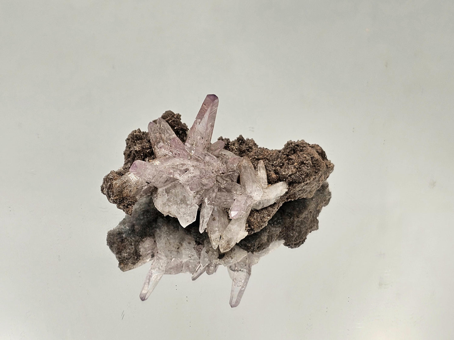 Polished Veracruz amethyst crystal with light violet color and transparency