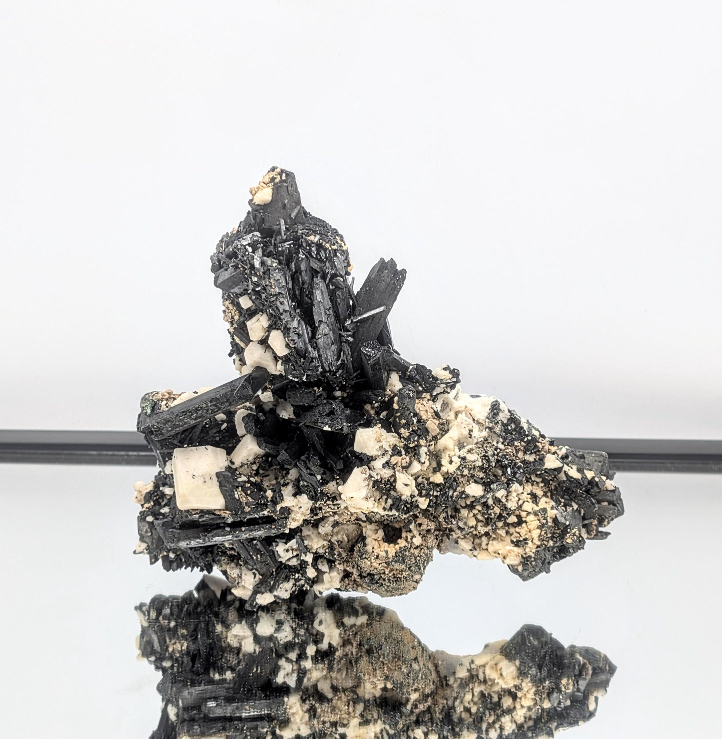 Bold mineral specimen with defined crystal structure and contrast.