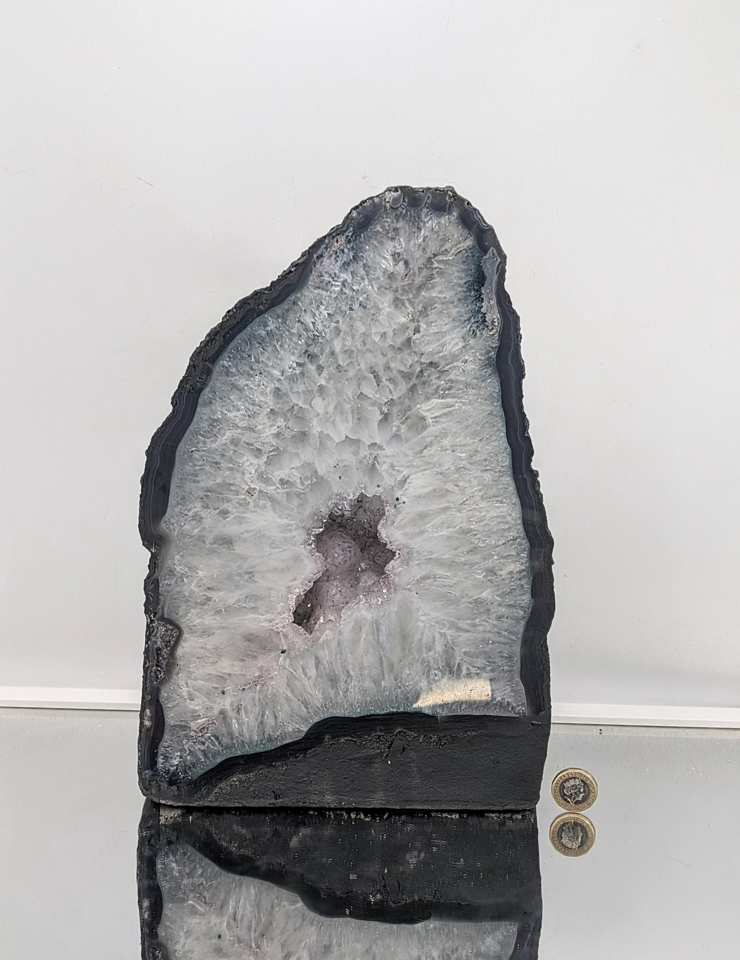 Collectible amethyst church geode with unique color variations