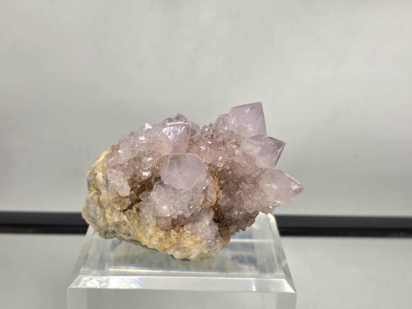 Amethyst cluster with lilac and violet hues.