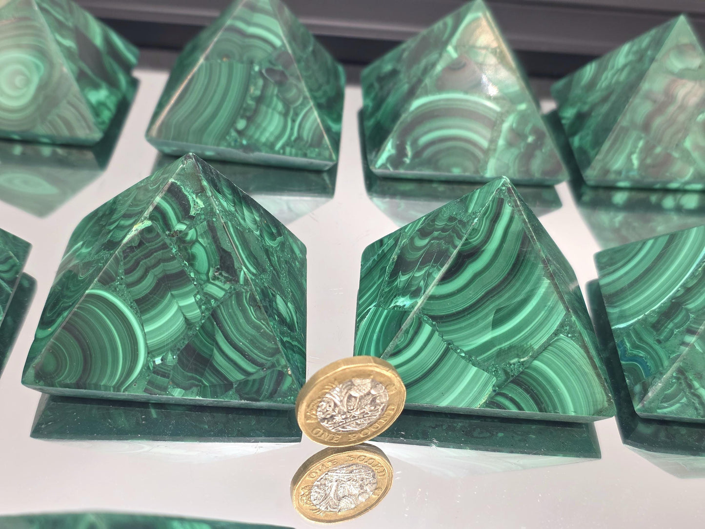Artisan-crafted malachite pyramid for gifting