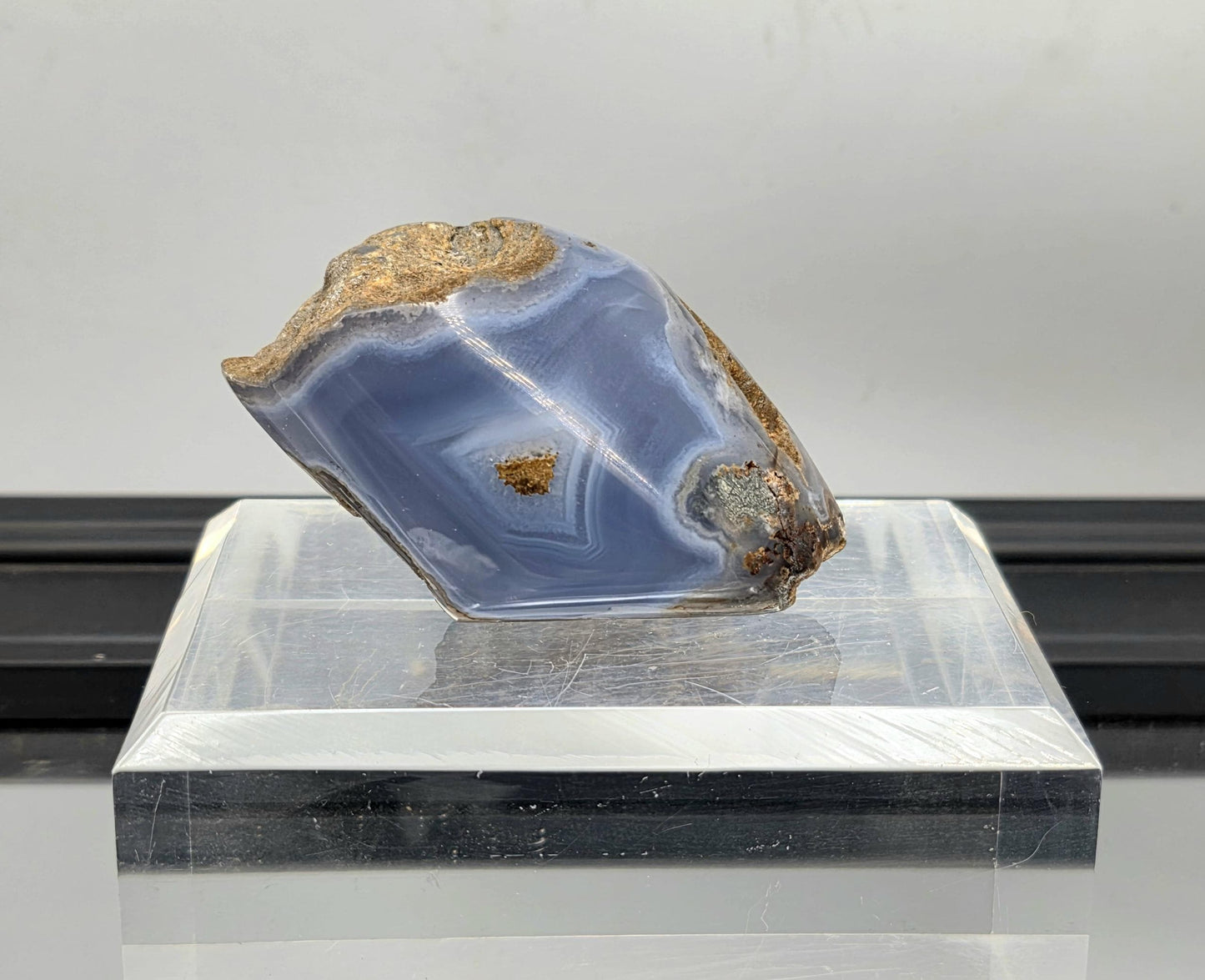 Natural wavy patterns on polished Malawi Agate stone