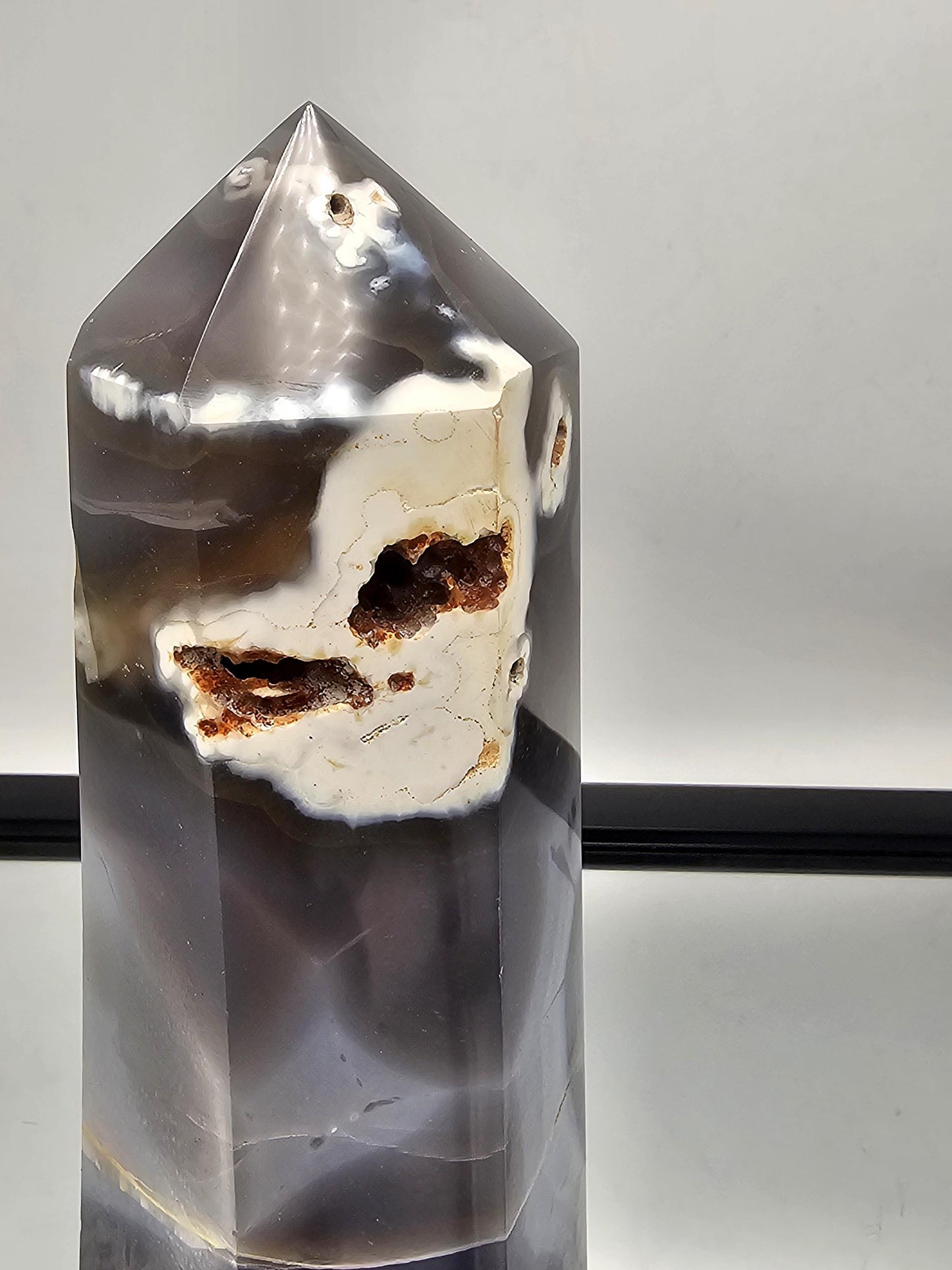 Blue and white Orca Agate tower, ideal for home or office decor.
