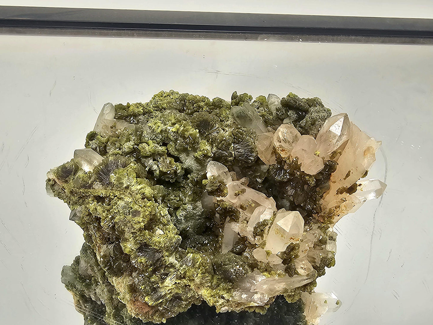 Wide variety of Forest Epidote Quartz crystal pieces in stock.
