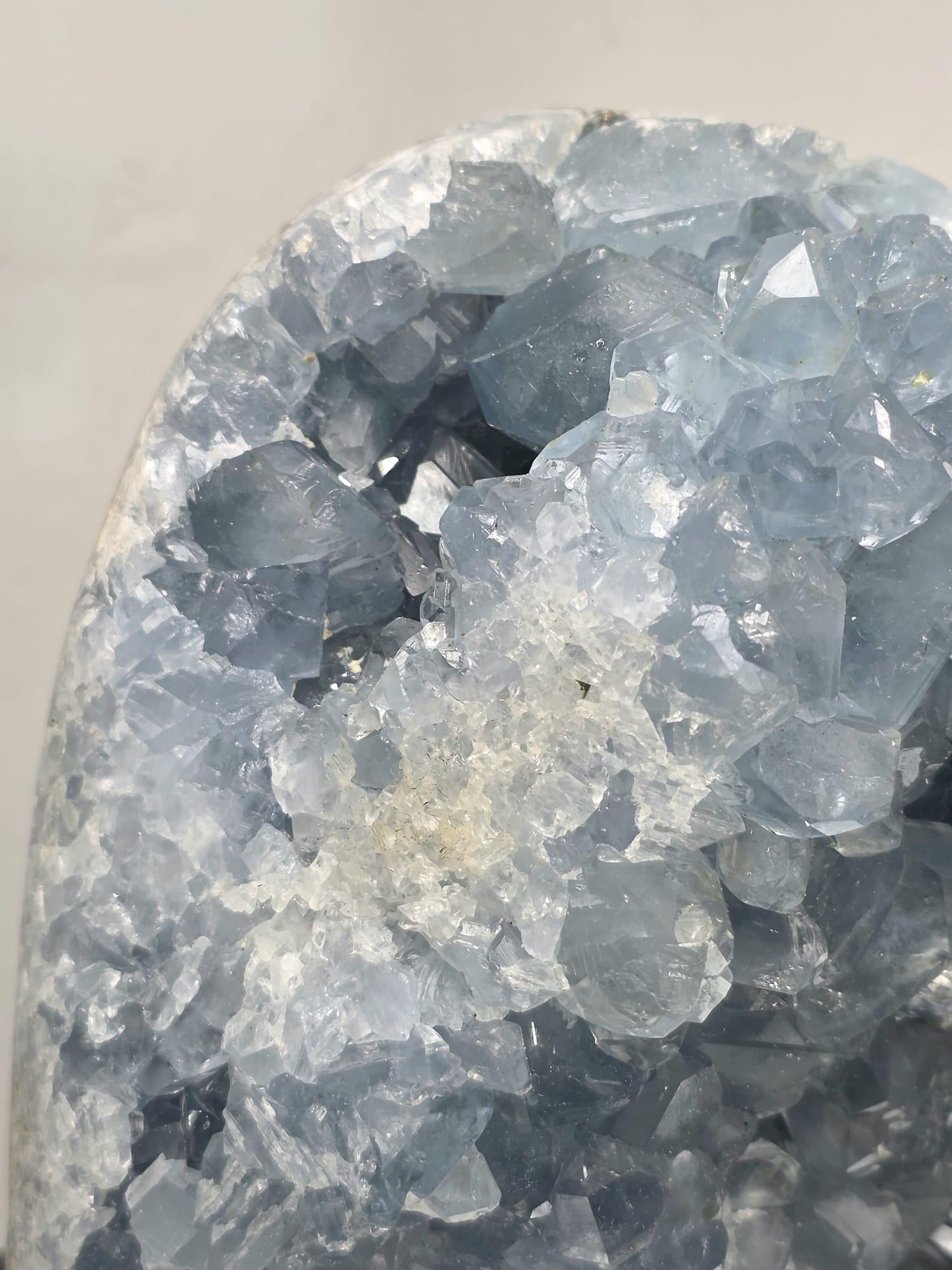 Front view of the Celestite freeform showing vibrant blue crystal formations and natural structure.