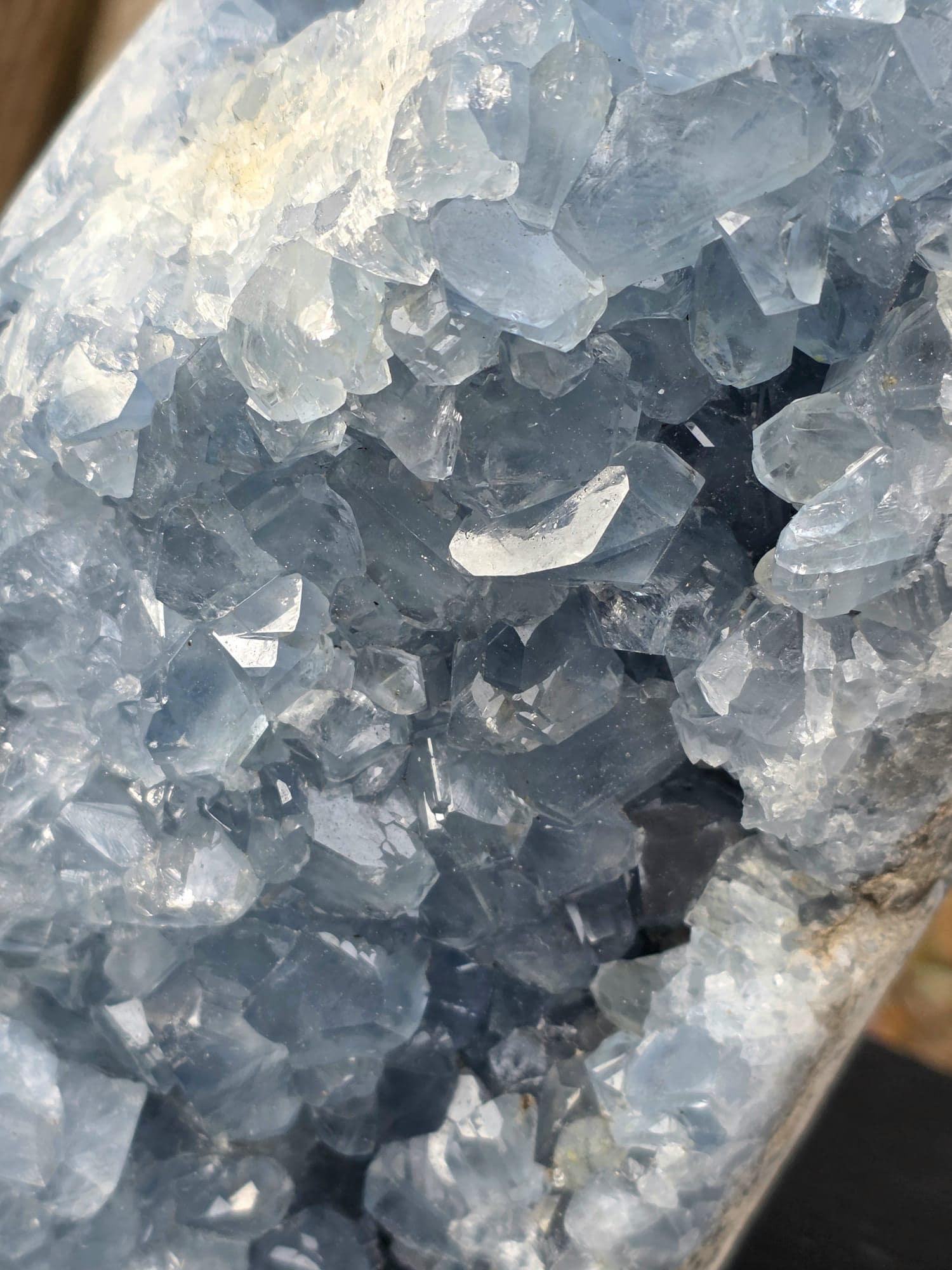 Top view showcasing the internal crystal clusters and light reflections.