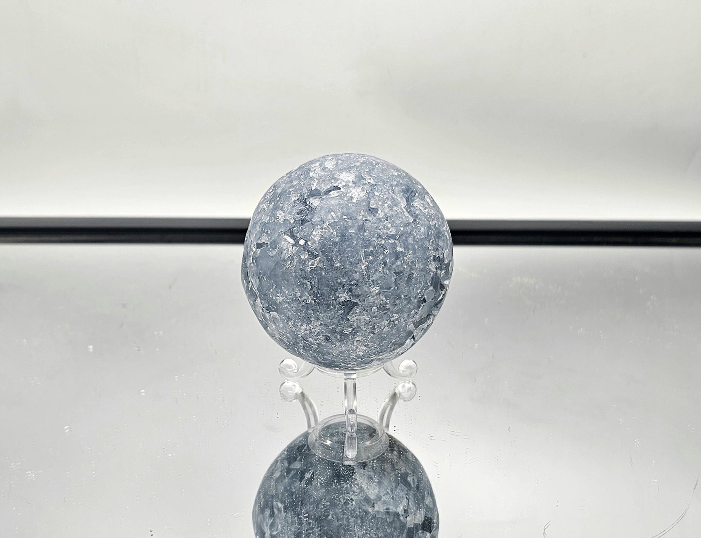 Celestite Sphere as a calming addition to modern office décor.