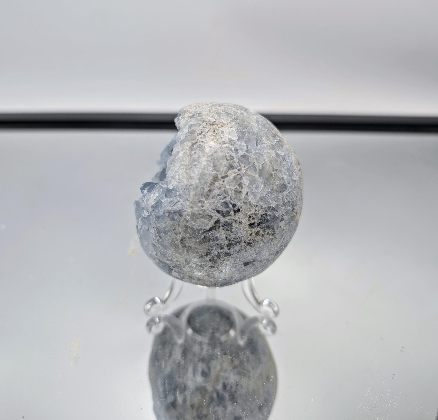 Celestite Sphere as a calming addition to modern office décor.