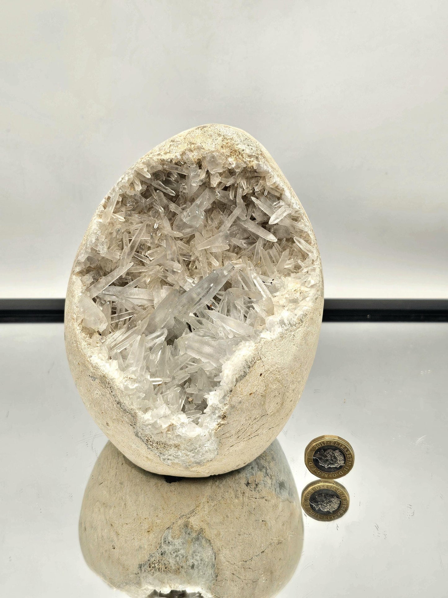 Blue Celestite Crystal Geode featuring intricate crystal clusters.
