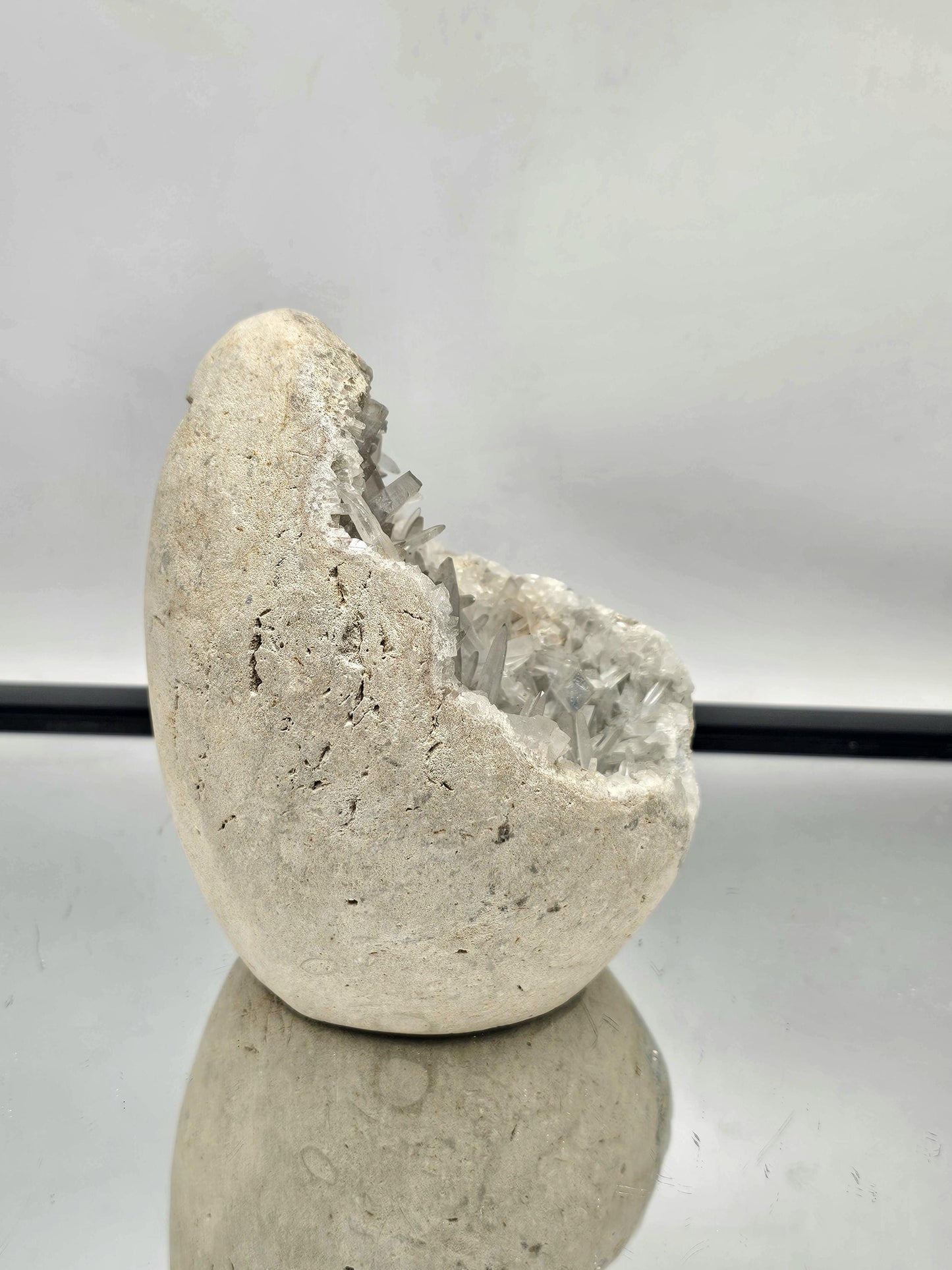 Collectible Celestite Crystal Geode with detailed crystal formations.