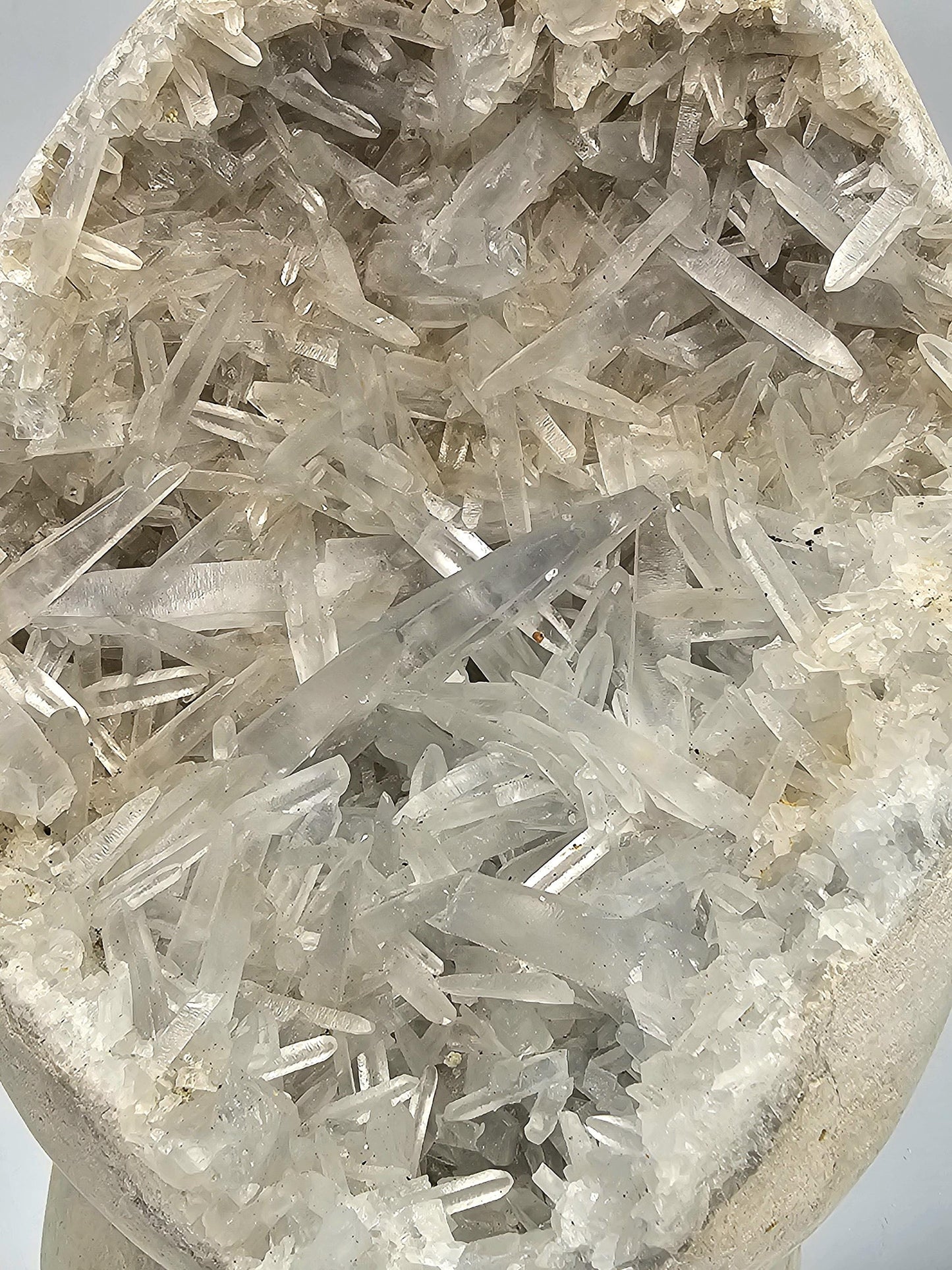 Natural Celestite Geode showcasing fine blue crystal points for elegant décor.