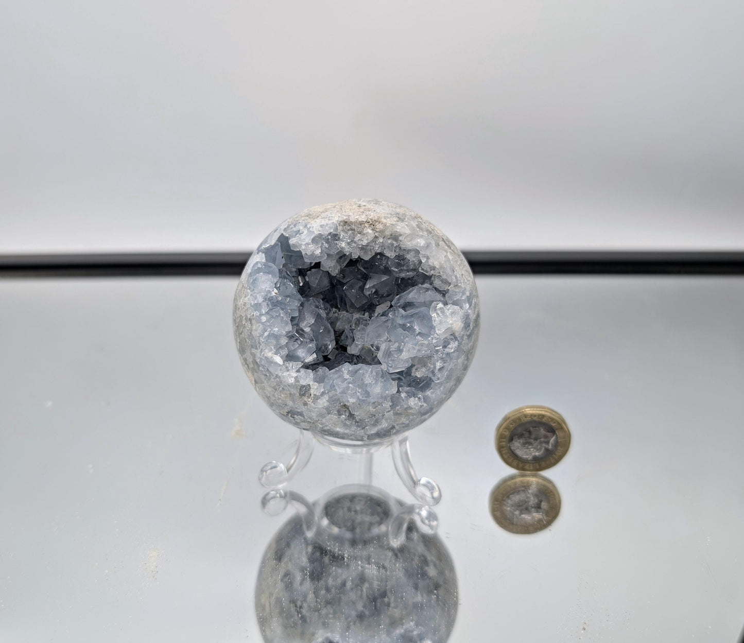 Decorative Celestite Sphere accessory for elegant interiors.