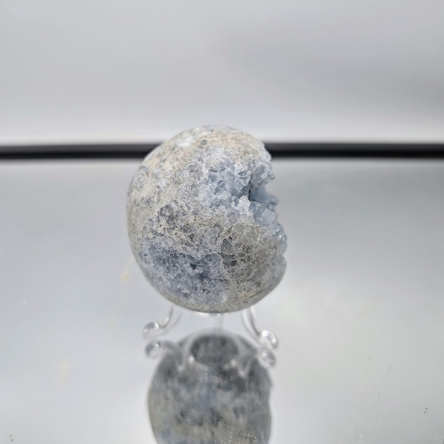 High-quality Celestite mineral sphere, perfect for collectors.