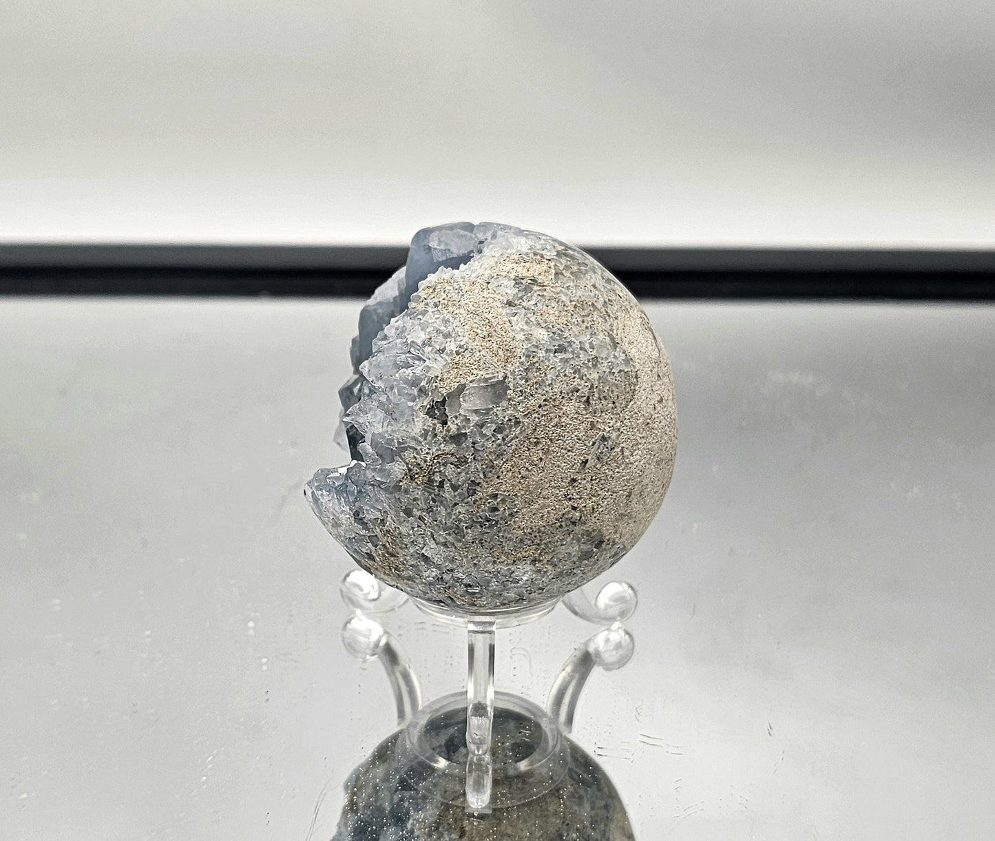 High-quality Celestite mineral sphere, perfect for crystal collectors.