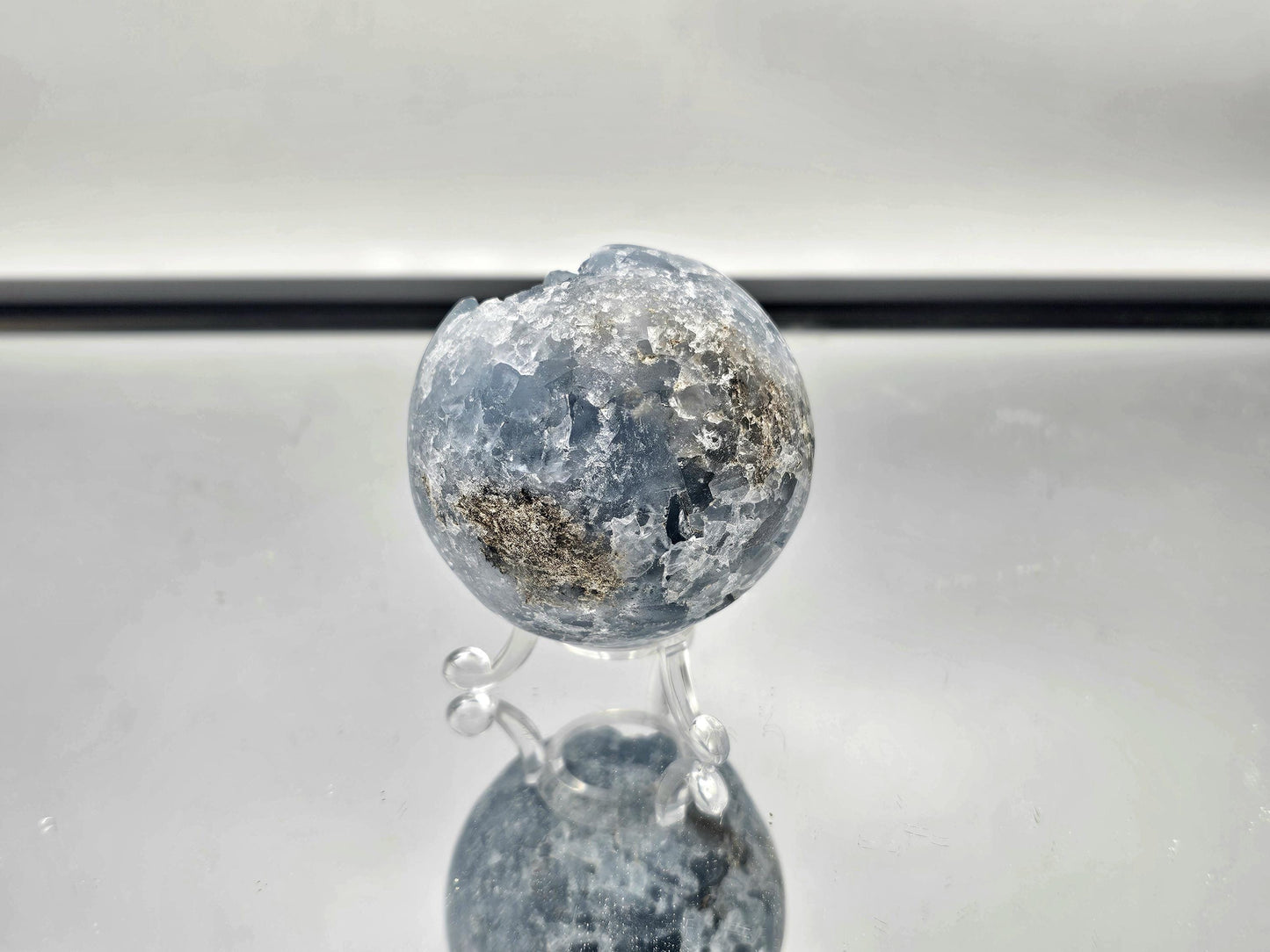 Spiritual home décor with a polished Celestite Sphere.