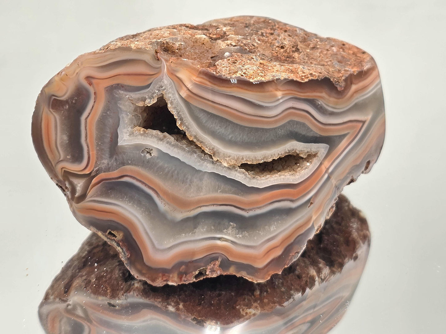 Collector’s polished high grade Malawi Agate geode.