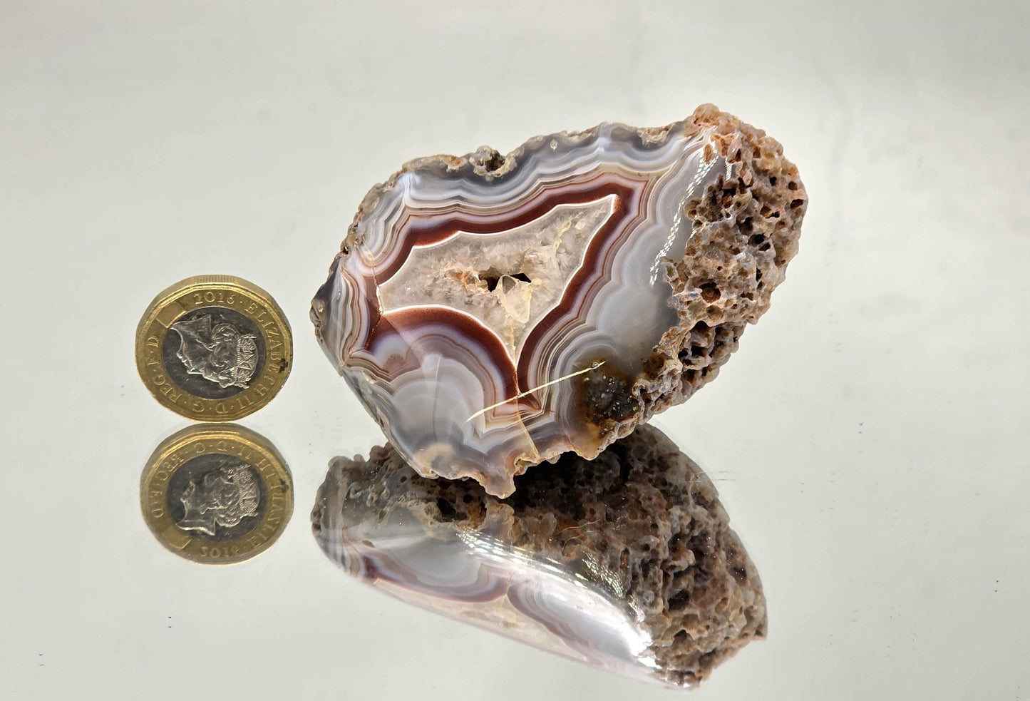 Colour banded Malawi Agate polished geode crystal.