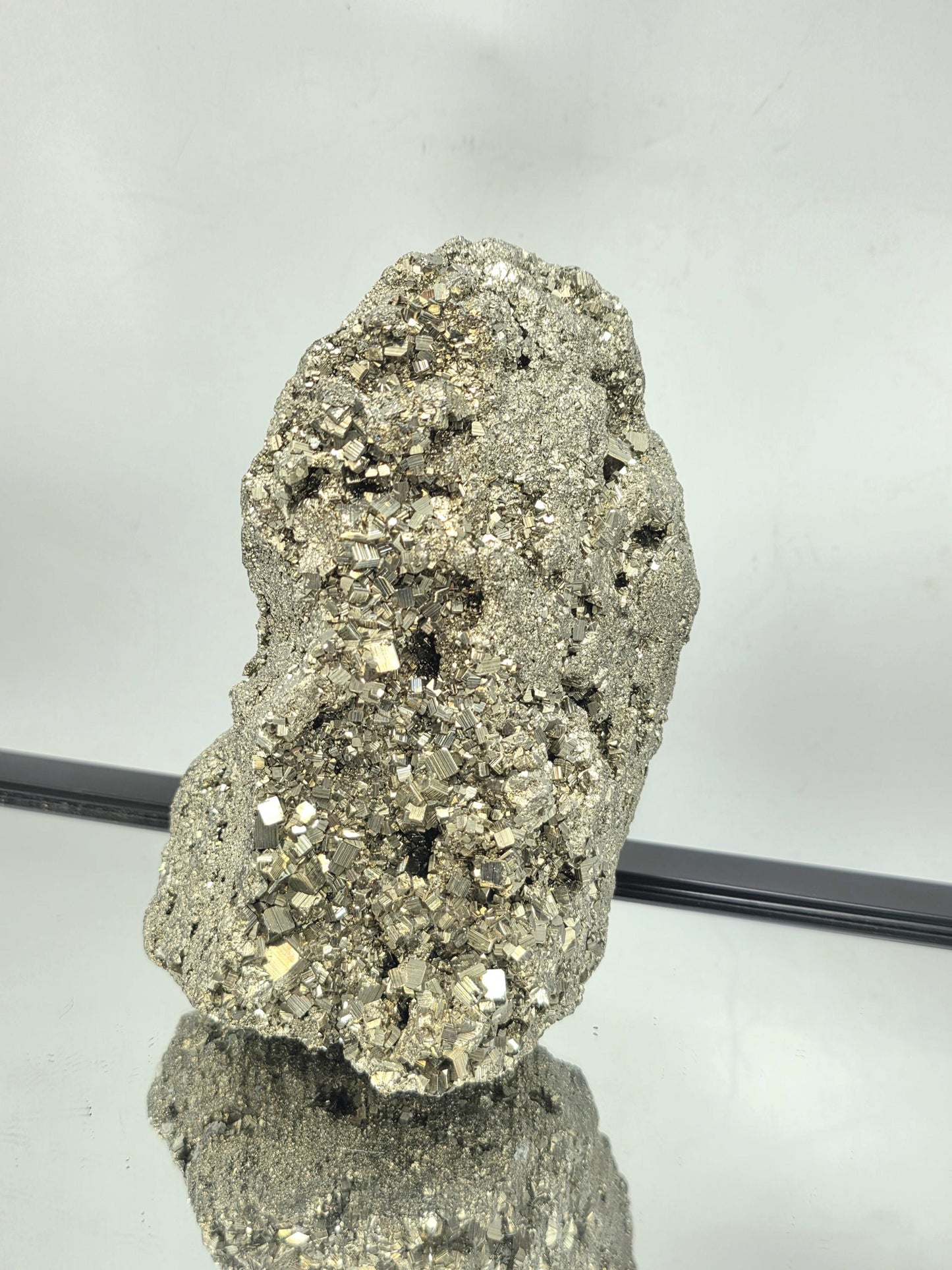 Pyrite cluster very large with sharp cubic crystal formations.