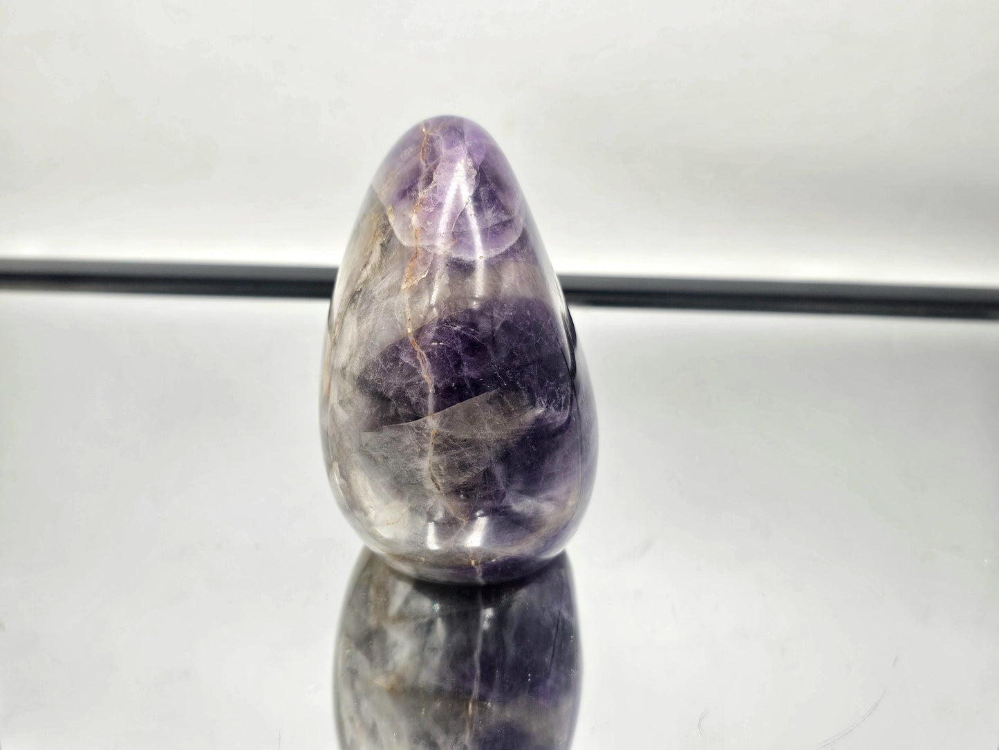 Close-up of the Dark Amethyst and Quartz crystal freeform, displaying its vibrant purple hues and clarity.