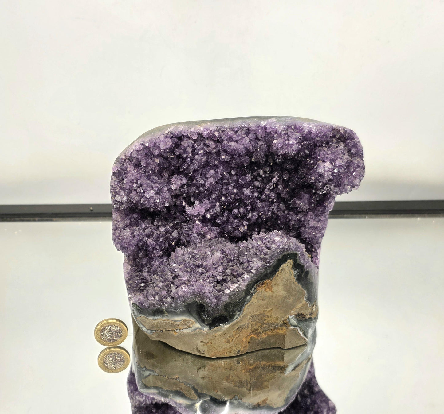 A deep purple Uruguayan Amethyst geode for home display.