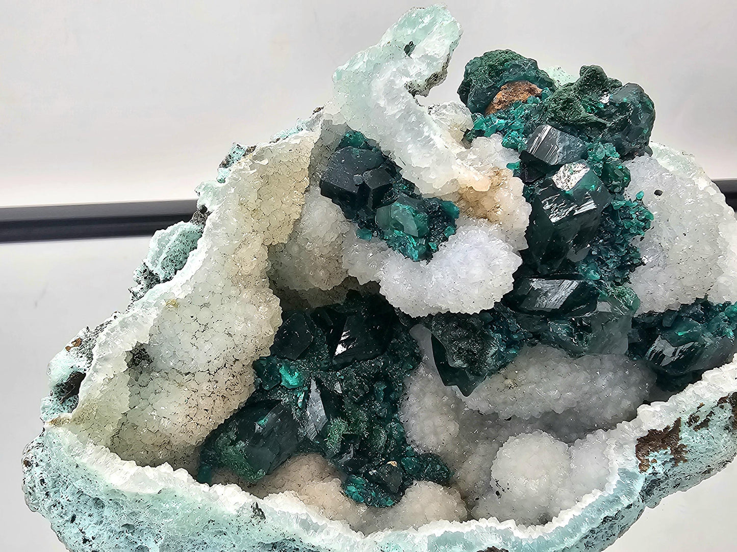 A truly exceptional Dioptase crystal specimen on Quartz matrix, handpicked for our exclusive collection.
