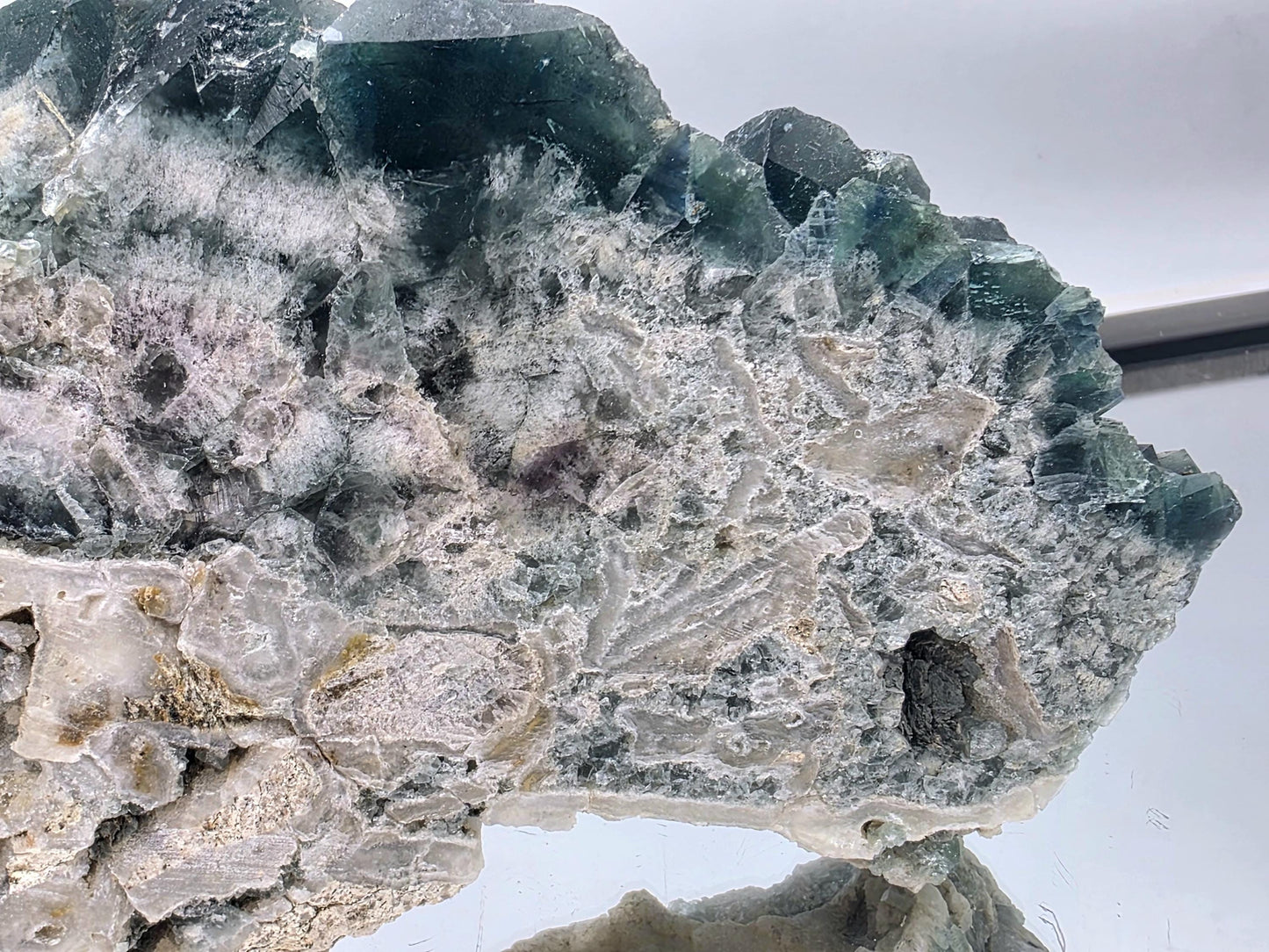 Madagascan Fluorite crystal slice with UV fluorescence.