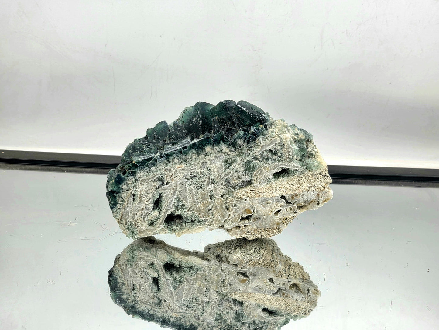 Madagascan Fluorite crystal slice with polished sides.