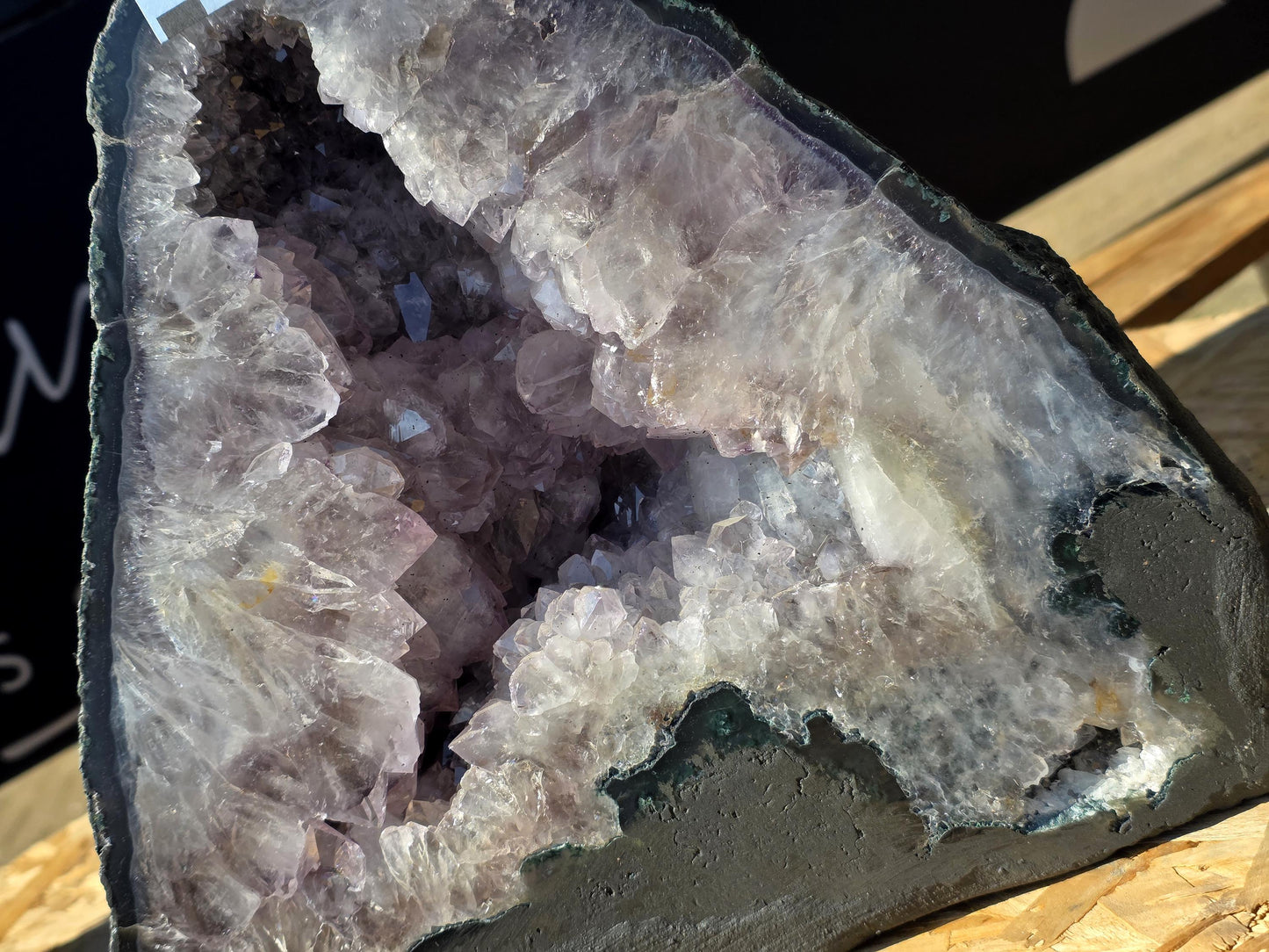 A freestanding Amethyst geode, blending with elegant interiors.