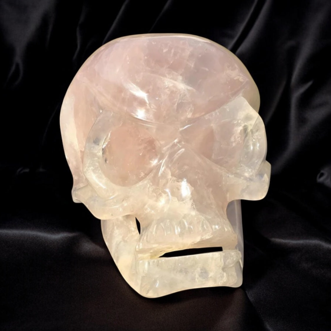 a large rose quartz crystal skull