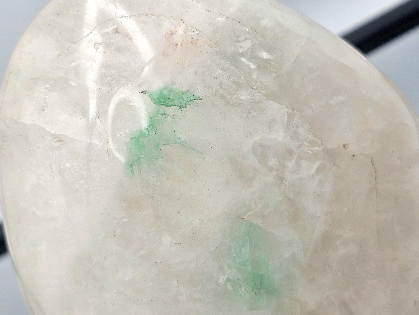 Quartz crystal with stunning Green Fuchsite inclusions, showcasing its natural beauty and rarity from Madagascar.