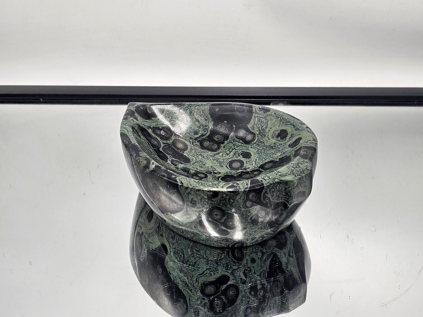 Green Kambaba Jasper leaf-shaped crystal bowl.