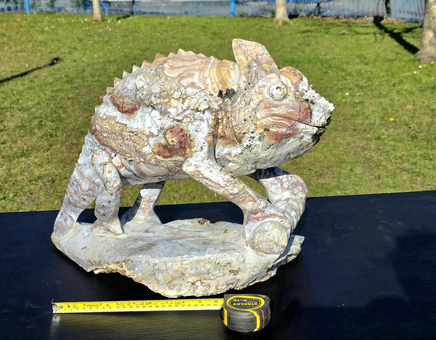 A masterfully hand-carved Jasper sculpture for upscale home décor.