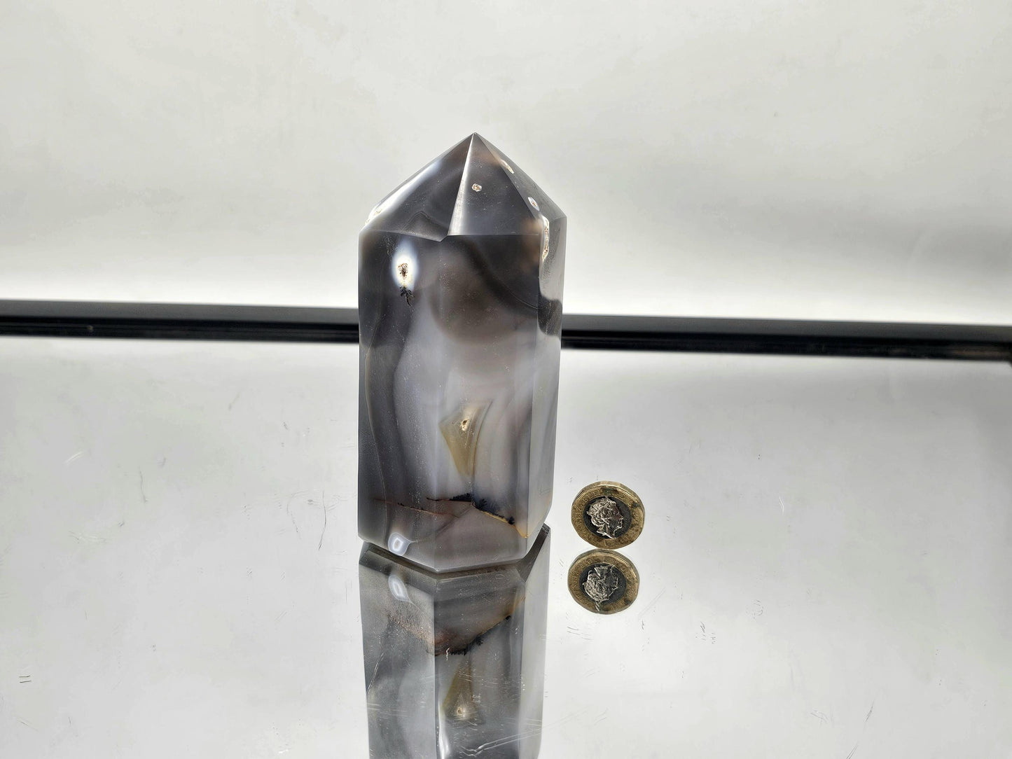 Hand-polished Orca Agate crystal for energy cleansing.