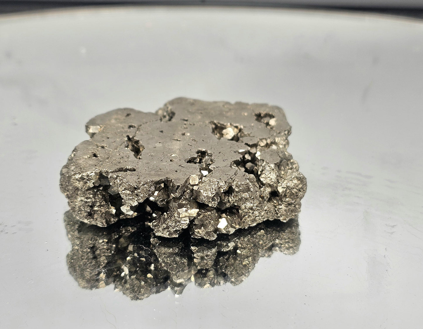 Hand-polished Pyrite slice, perfect for luxury home decor.