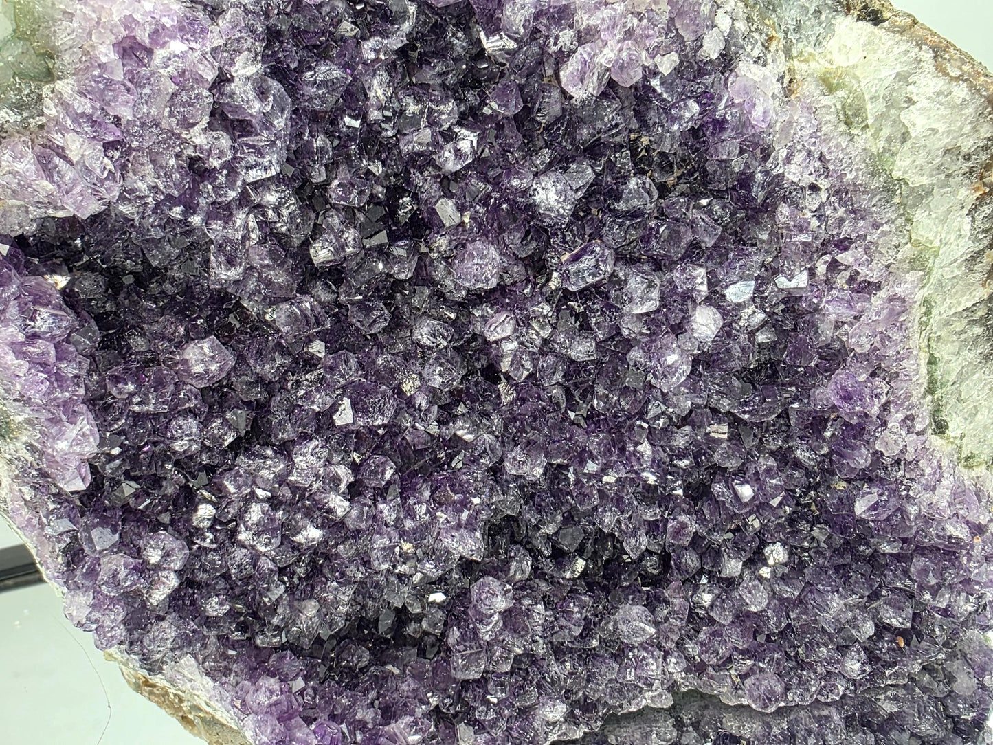 A high-quality Amethyst geode, perfect for display.