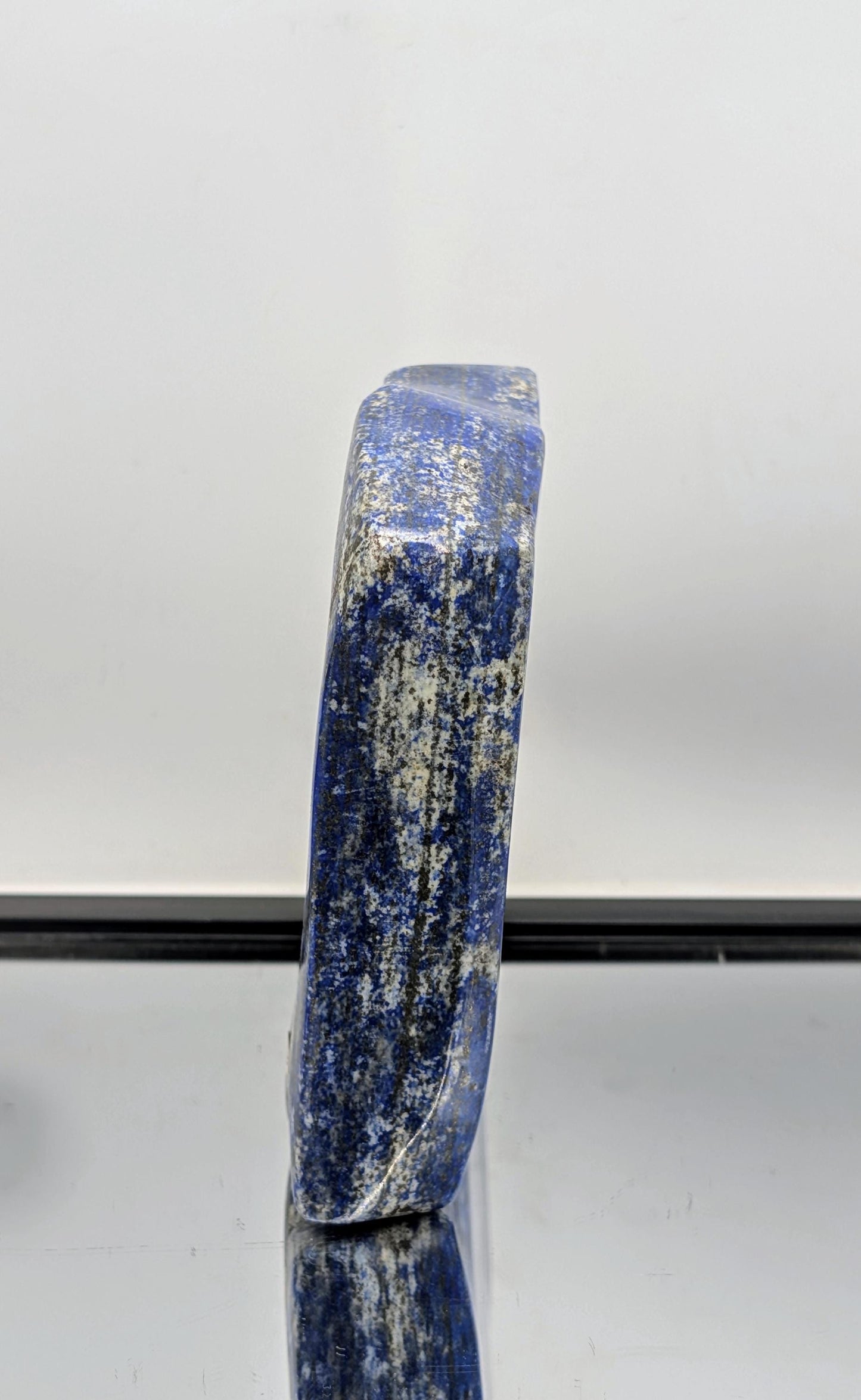 Natural gemstone freeform of Lapis Lazuli with polished finish.
