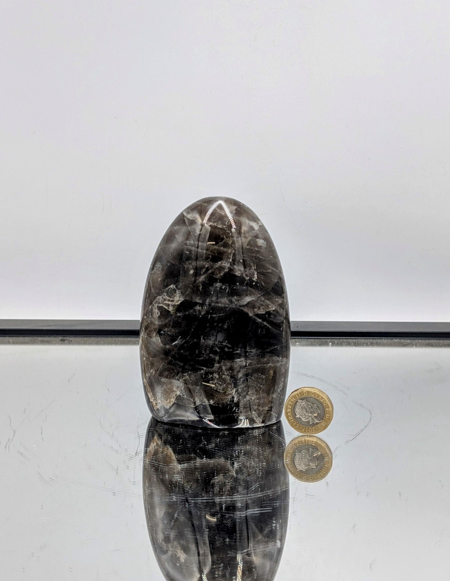 natural dark Smoky Quartz freeform crystal with a polished finish.