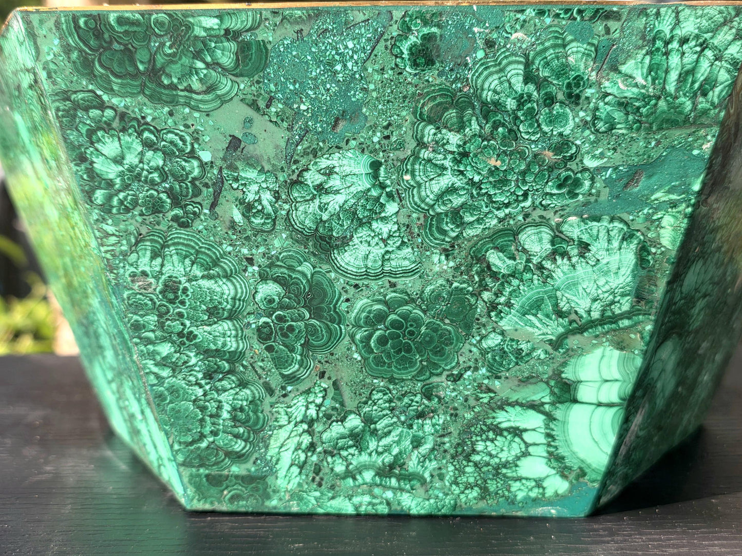 Unique handcrafted malachite flower pot, designed to elevate high-end home décor spaces.