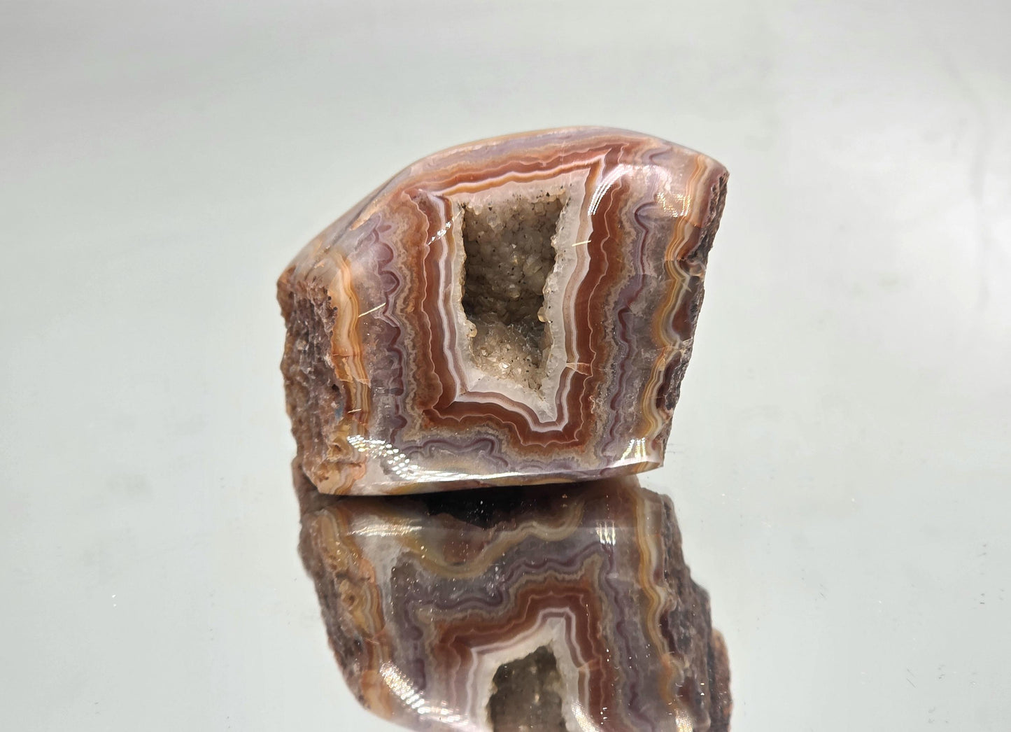 Large polished Malawi Agate geode crystal.