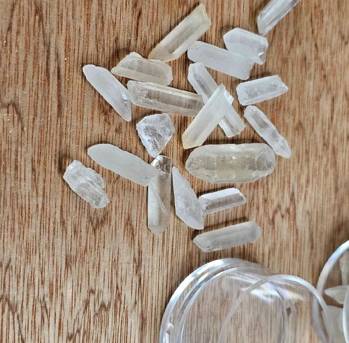 Quartz points from the same mine as Lemurian quartz, faint striations visible