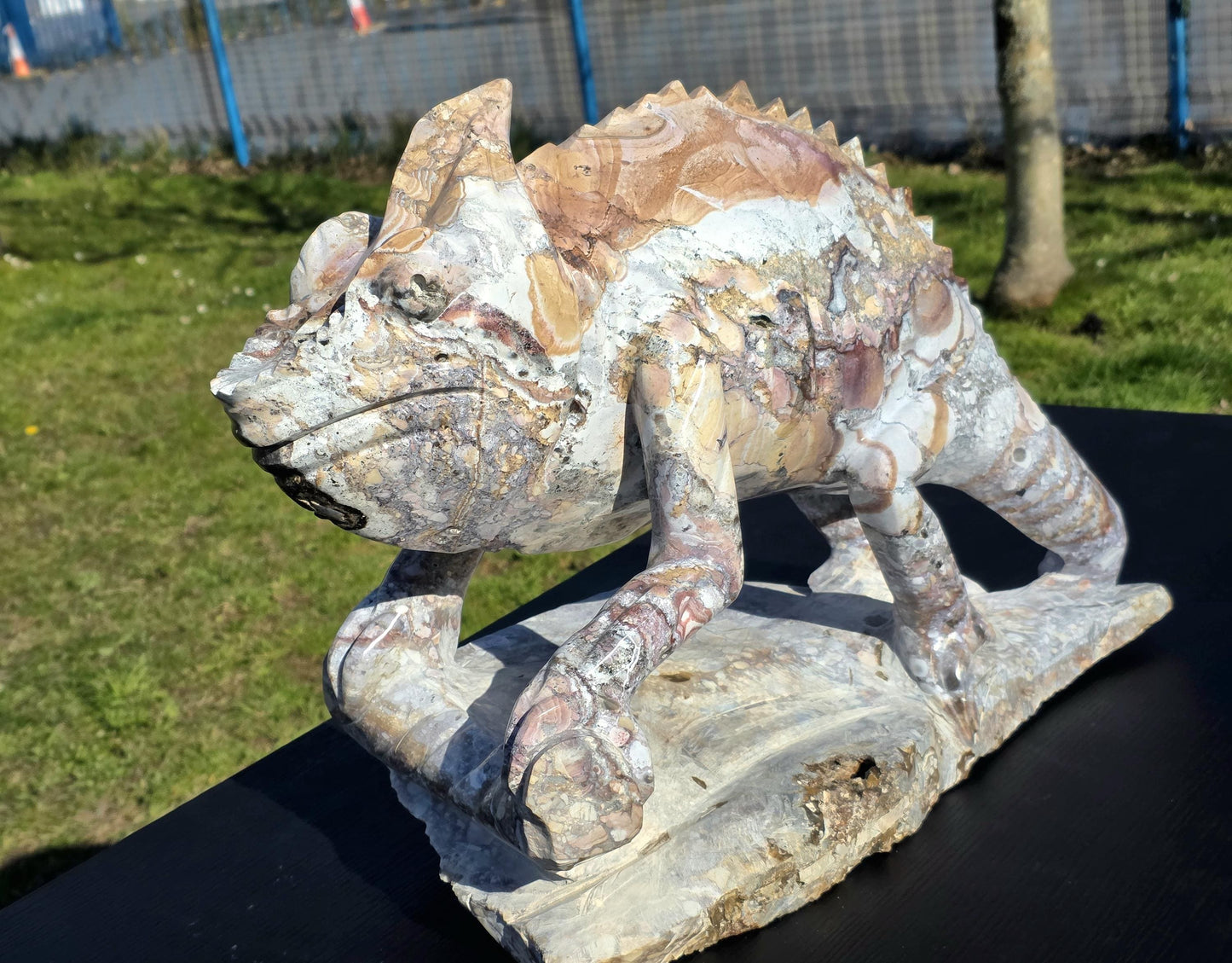 A grand Chameleon Ibis Jasper crystal carving, perfect for luxury interiors.