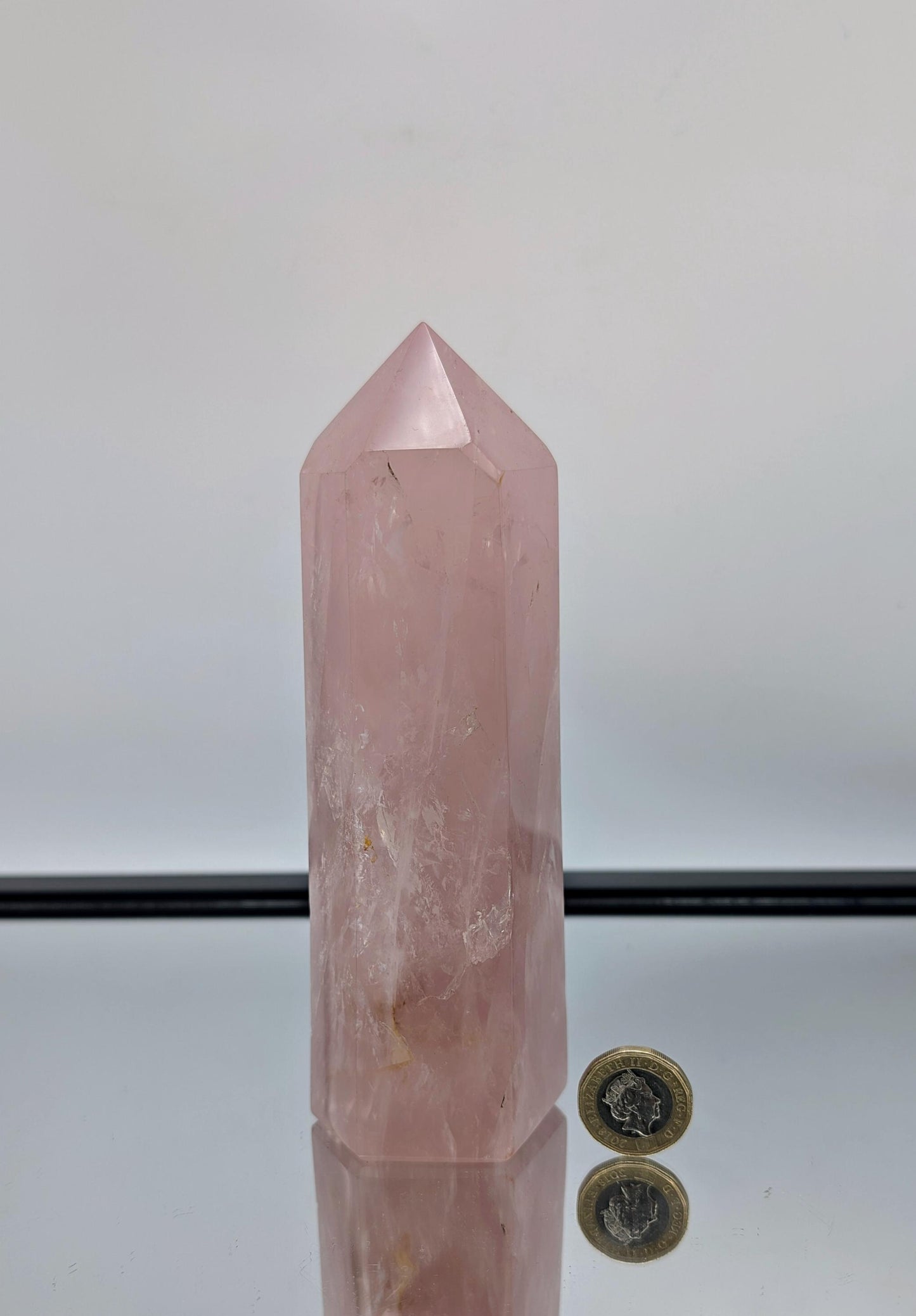Luxury large rose quartz prism, hand-carved and polished for sophisticated interiors.