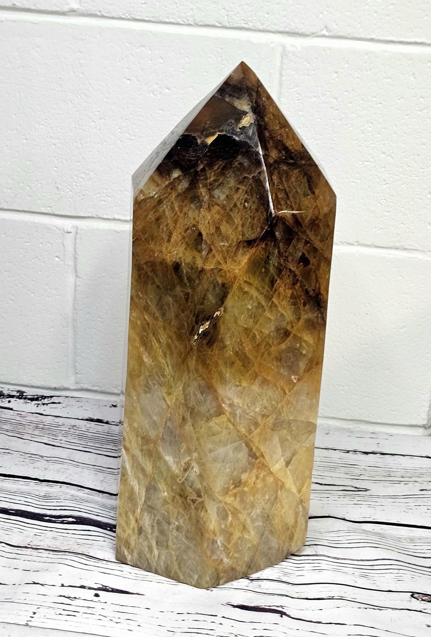 Unique Golden Healer Crystal Prism, perfect for upscale interiors.