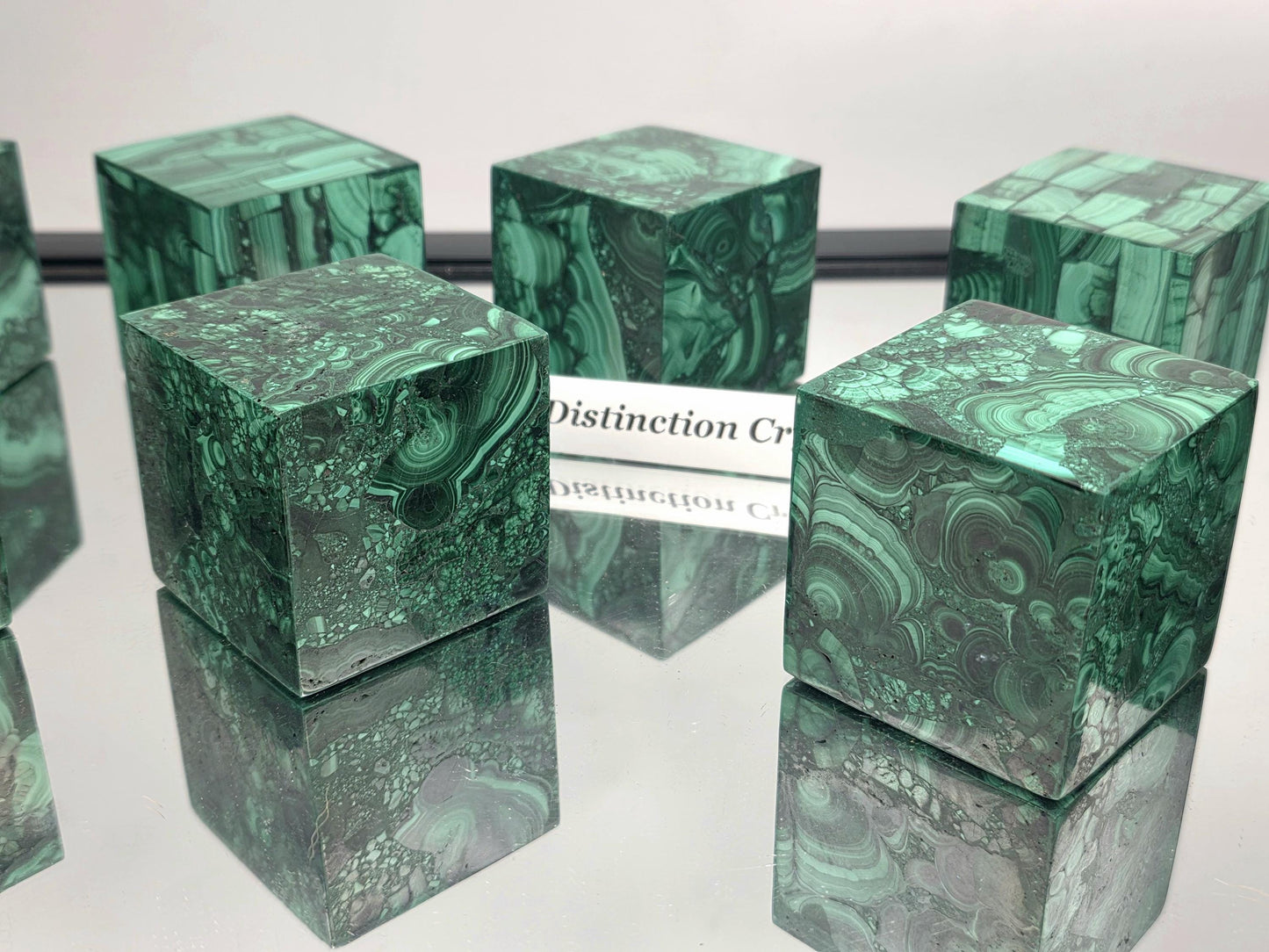 Hand-polished large Malachite cube with deep green banding for luxury décor.
