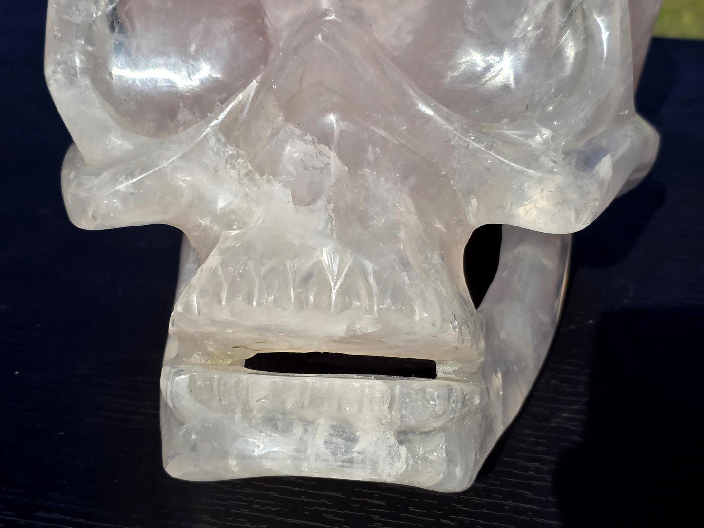 A luxury Rose Quartz Skull with masterful carving details.