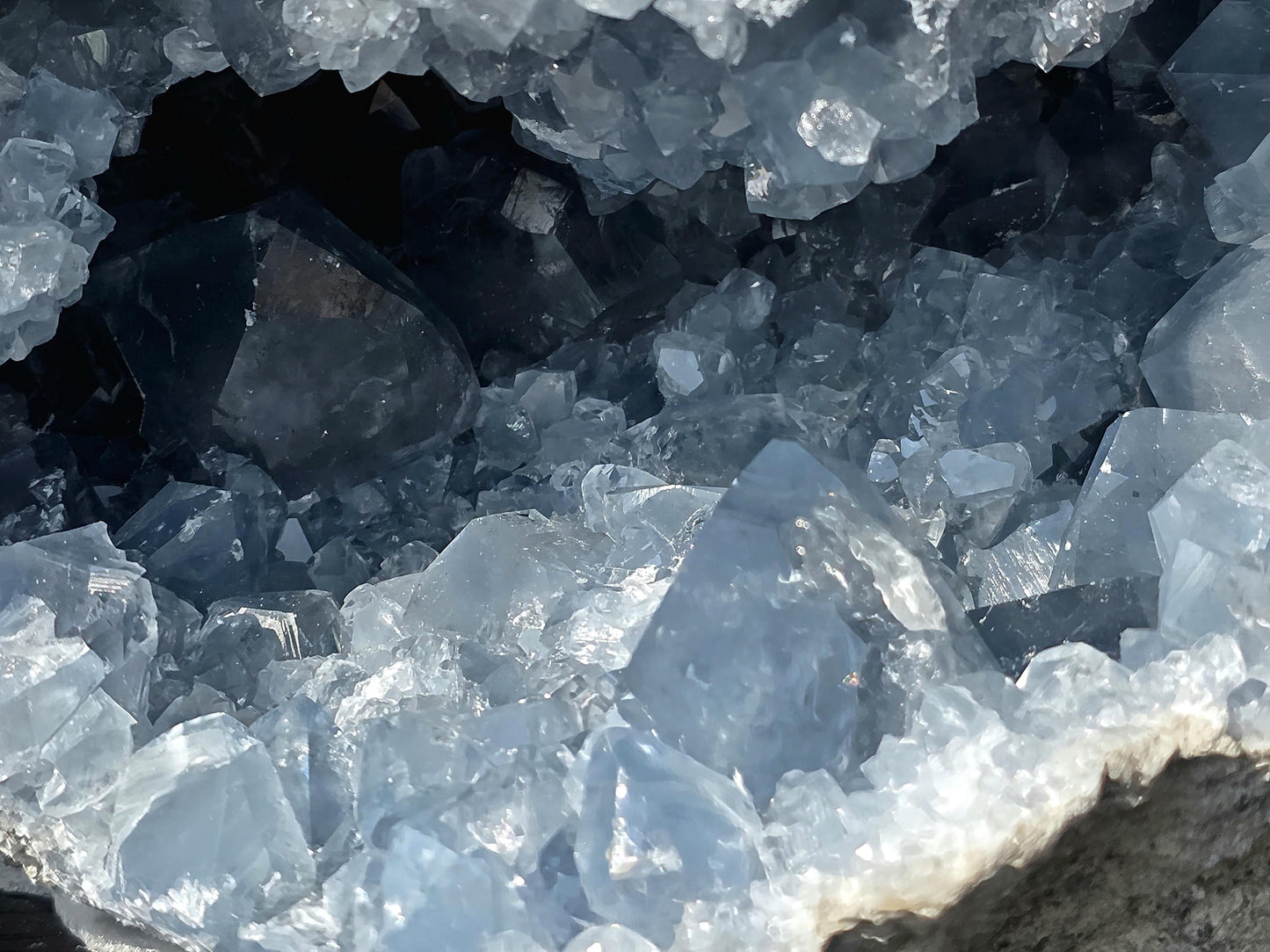 celestite geode cave featuring layered crystal clusters.