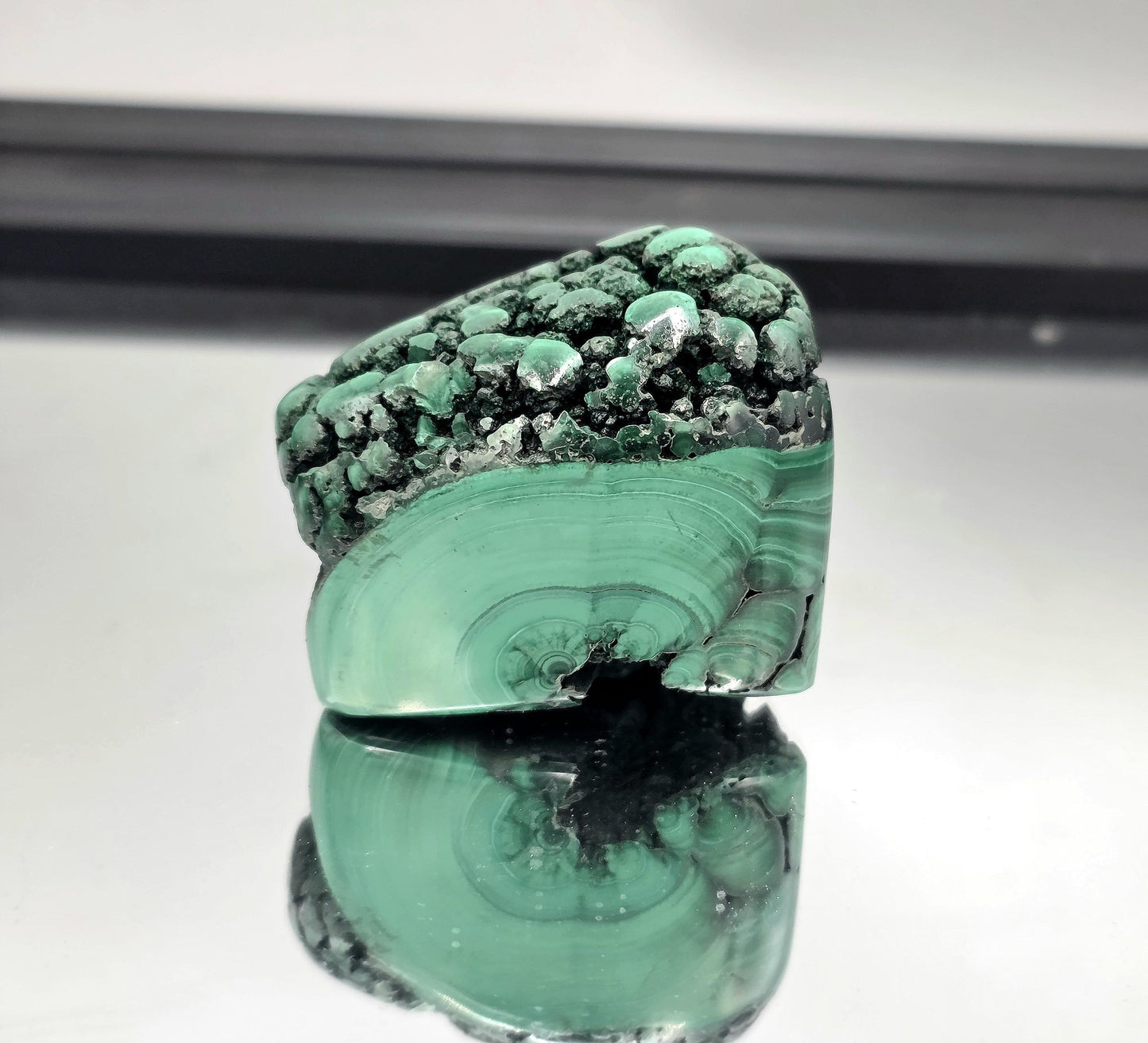 Statement malachite crystal styled on a modern console table