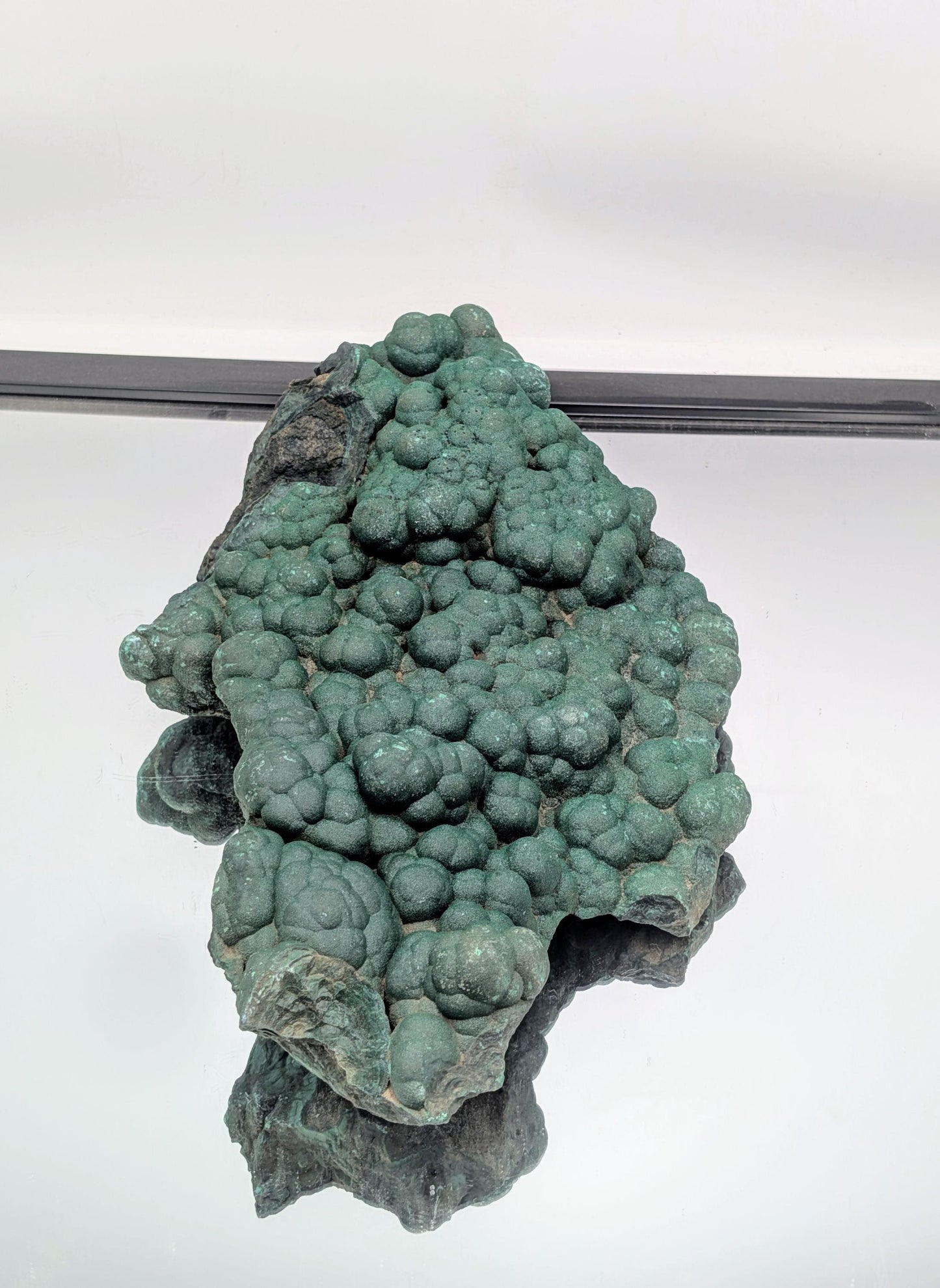 Collector's item: substantial malachite with quartz druzy accents.