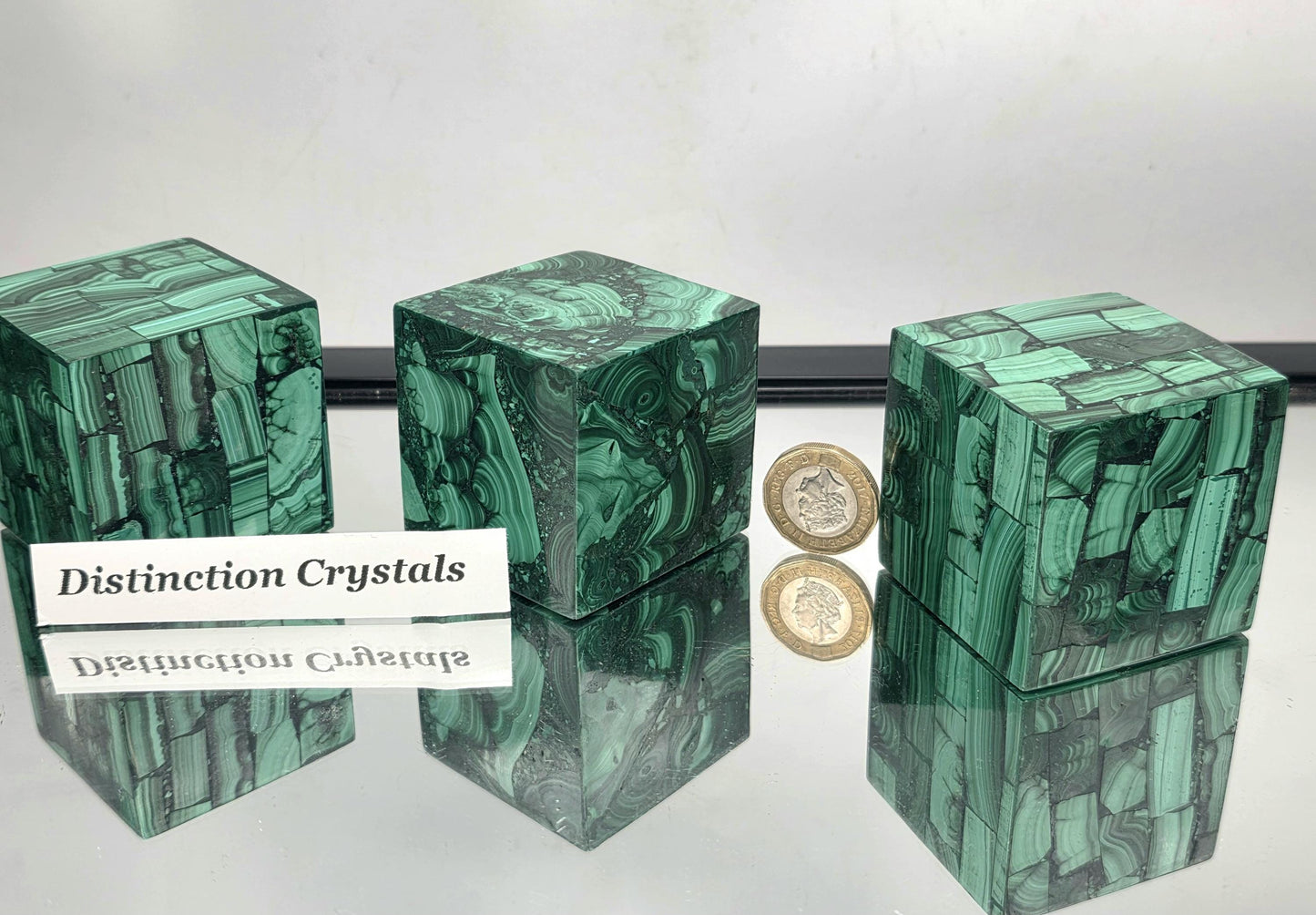 Collector’s Malachite cube showing natural swirling patterns.
